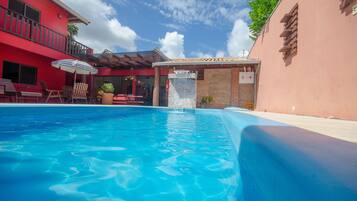 Outdoor pool, pool umbrellas, sun loungers