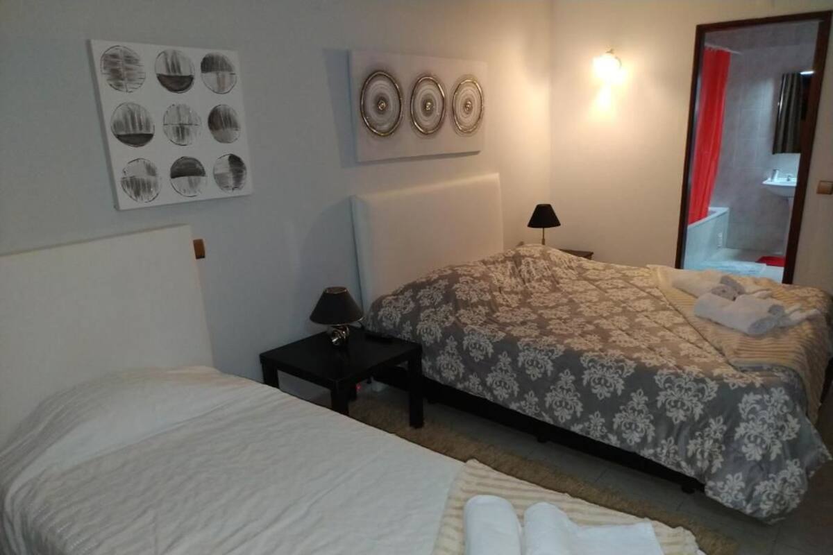 Triple Room, Balcony | Individually decorated, laptop workspace, blackout drapes