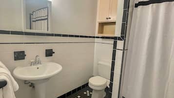 Hair dryer, towels, soap, shampoo
