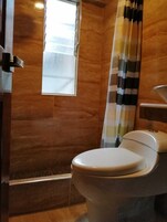 Shower, free toiletries, towels, soap