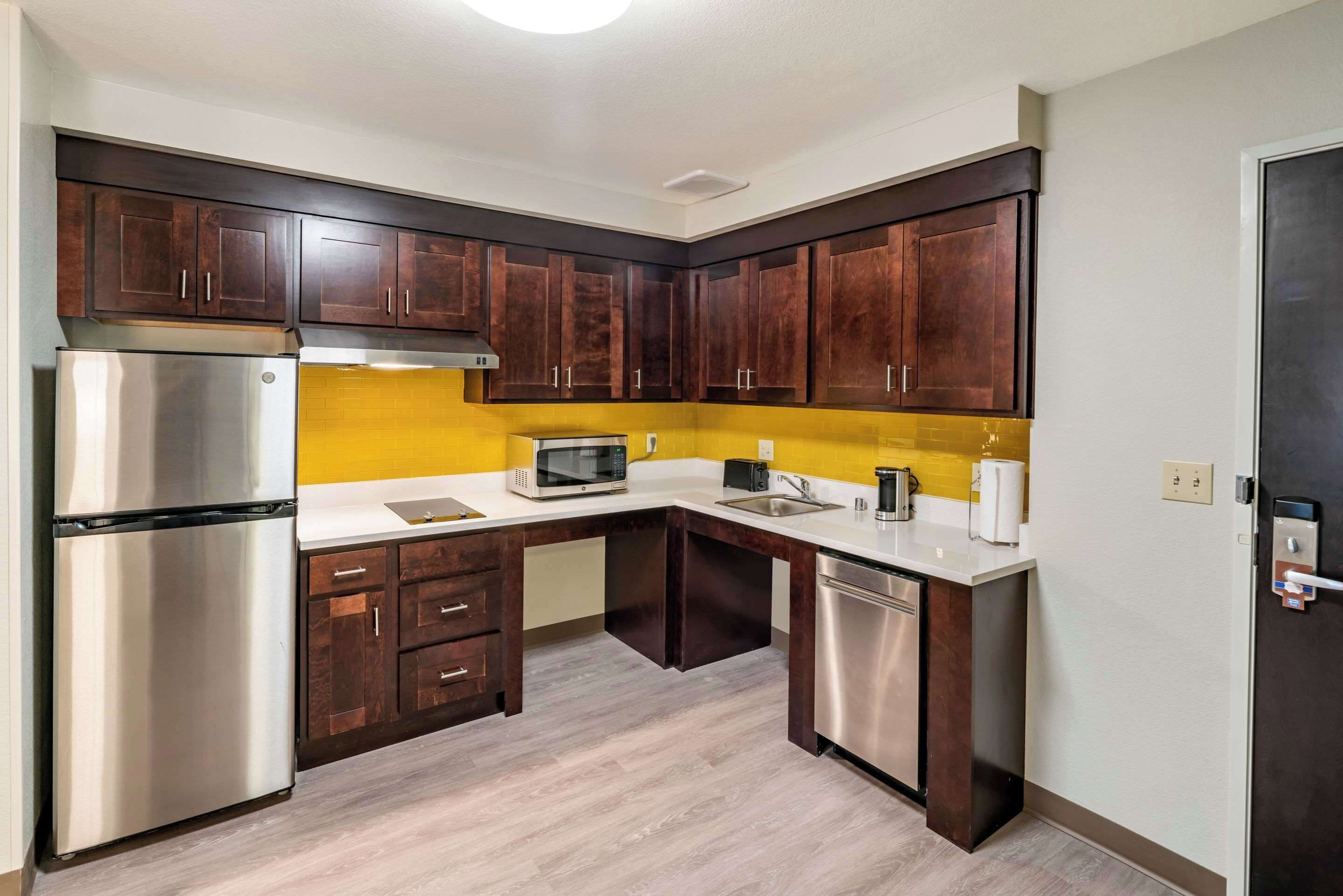 suite, 1 king bed, accessible, non smoking | desk, laptop workspace, iron/ironing board, free wifi