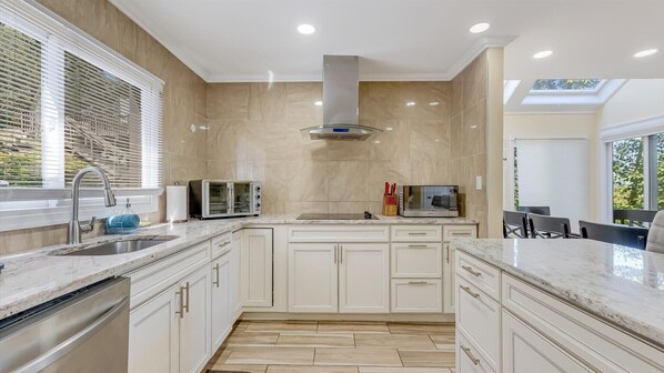 Fridge, microwave, dishwasher, coffee/tea maker