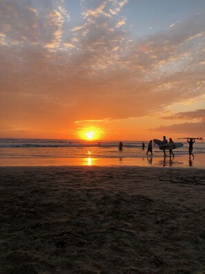 On the beach, sun loungers, beach towels