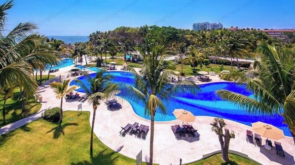 Outdoor pool, a heated pool - Beautiful Beach front condo Villa Magna (Nuevo Vallarta)