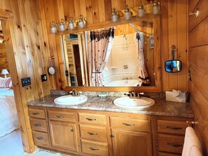 Combined shower/tub, hair dryer, towels, soap