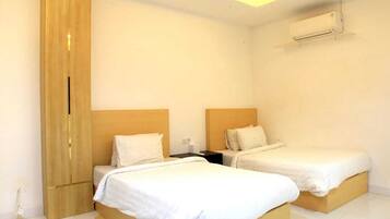 Family Triple Room, 3 Bedrooms, City View | Memory-foam beds, desk, laptop workspace, soundproofing