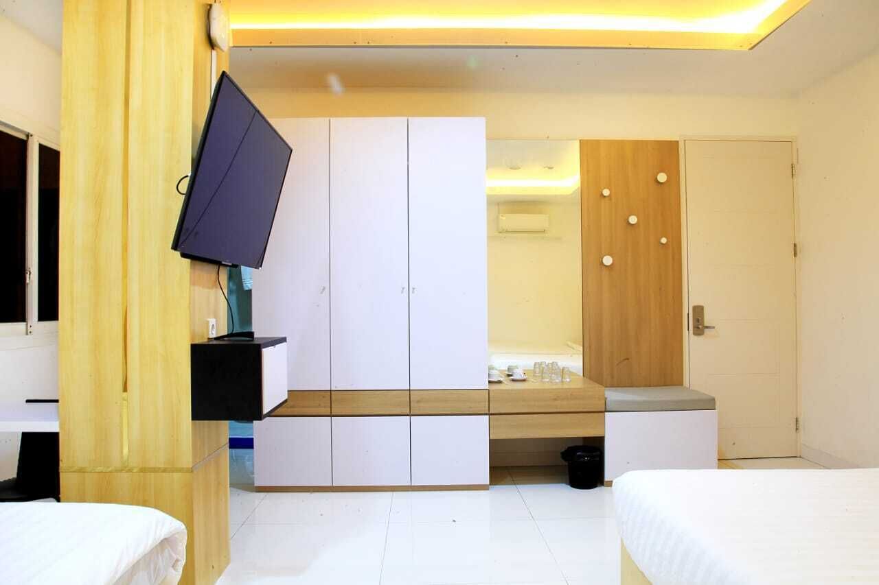 Family Triple Room, 3 Bedrooms, City View | Memory foam beds, desk, laptop workspace, soundproofing