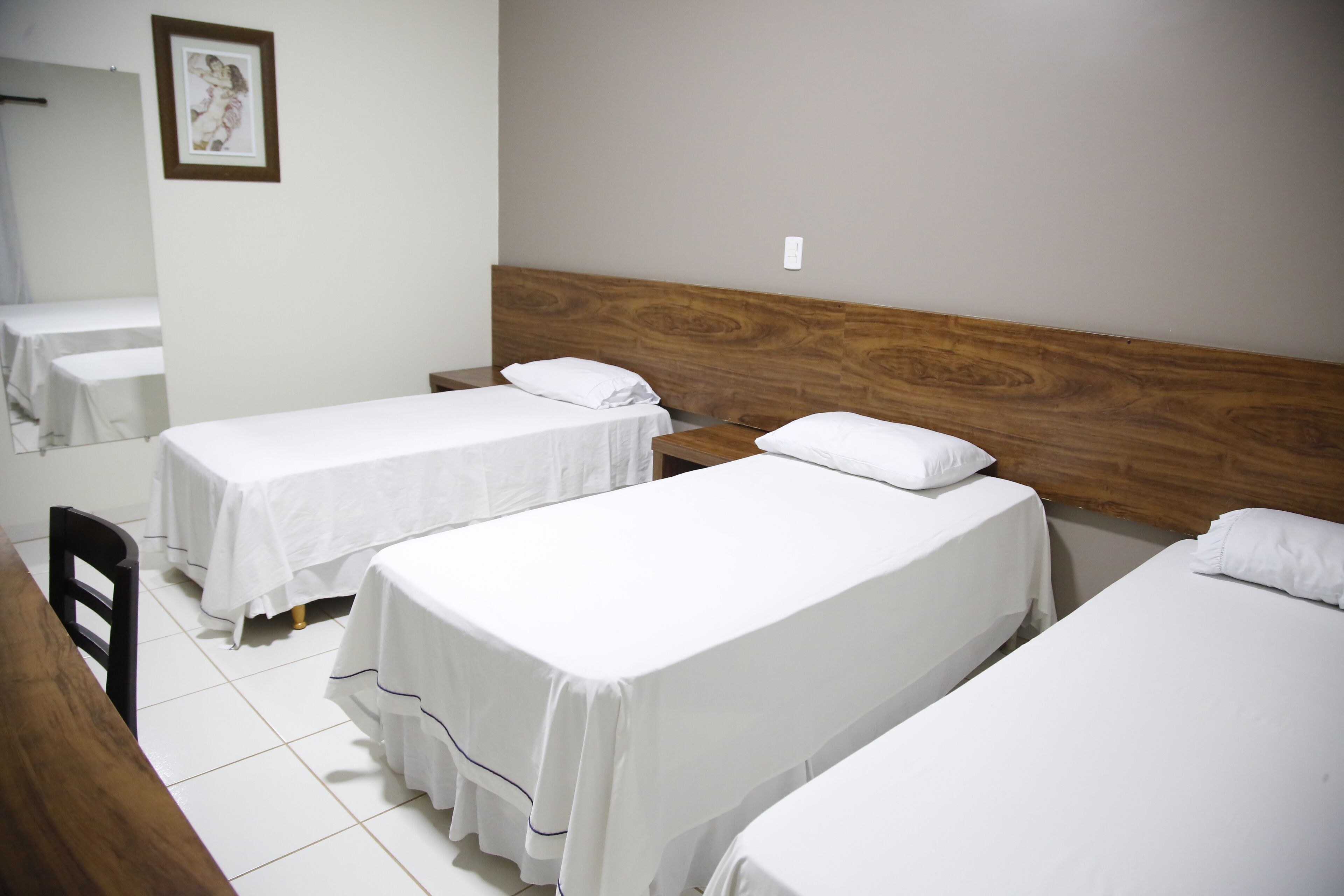 deluxe triple room | minibar, desk, blackout curtains, iron/ironing board