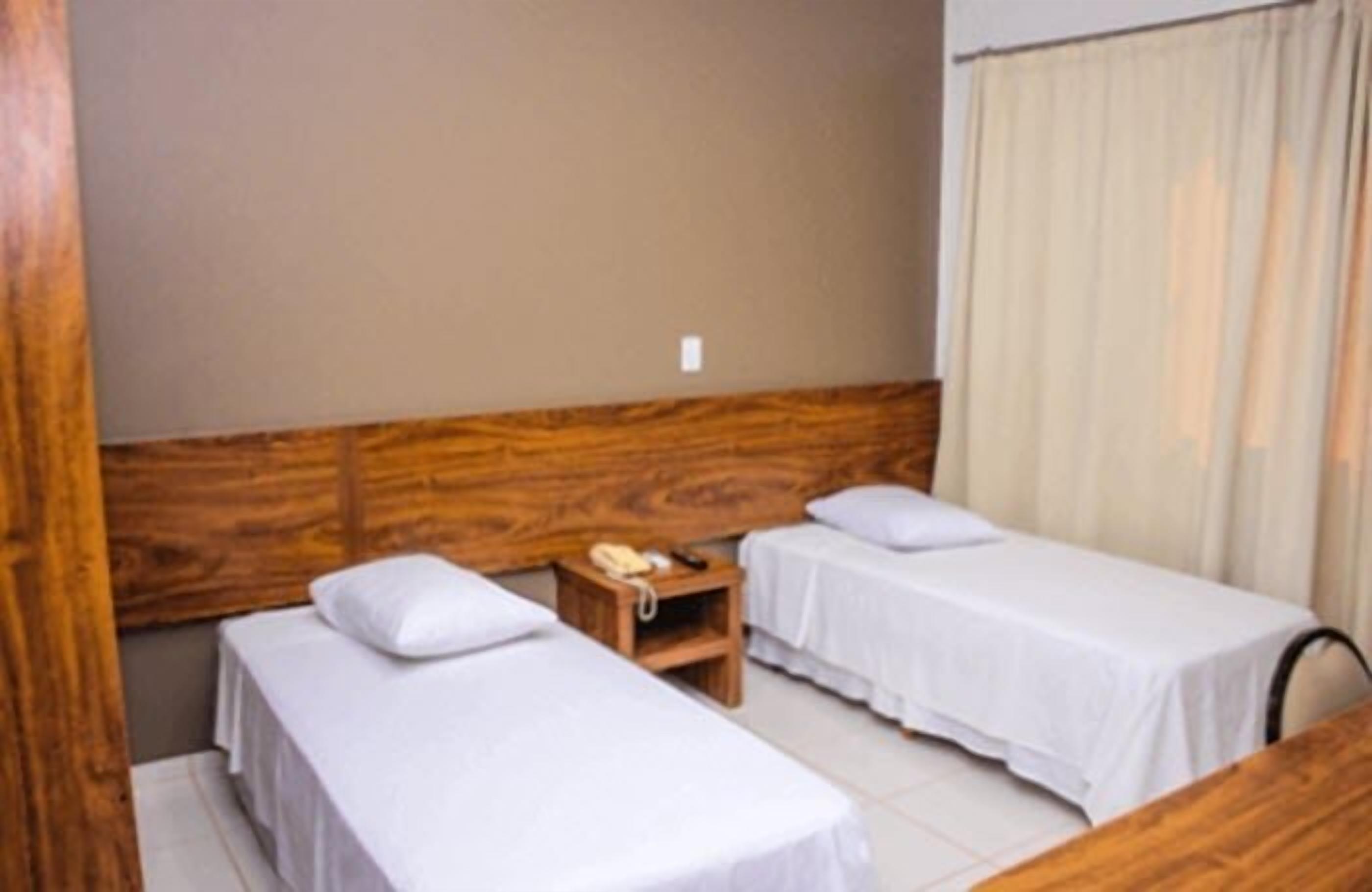 deluxe twin room | minibar, desk, blackout curtains, iron/ironing board