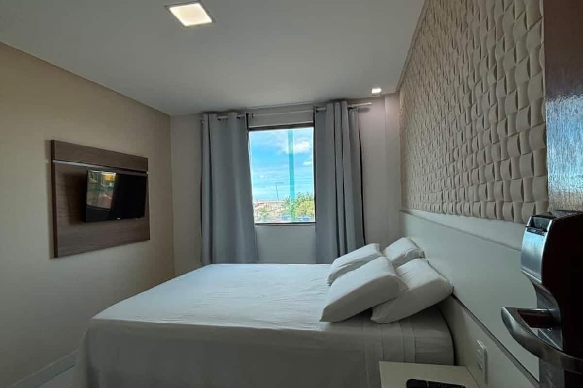 Pillowtop beds, desk, laptop workspace, blackout drapes