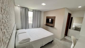 Camas com colchões pillow-top, individualmente decorados