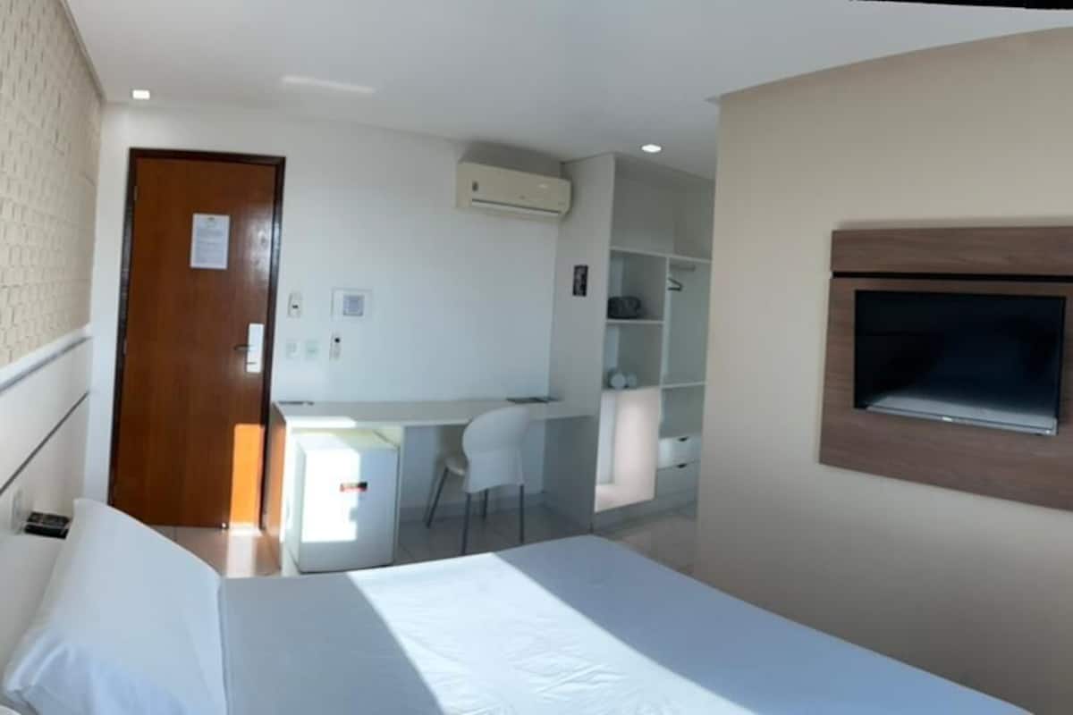 Quarto casal superior | Camas com colchões pillow-top, individualmente decorados