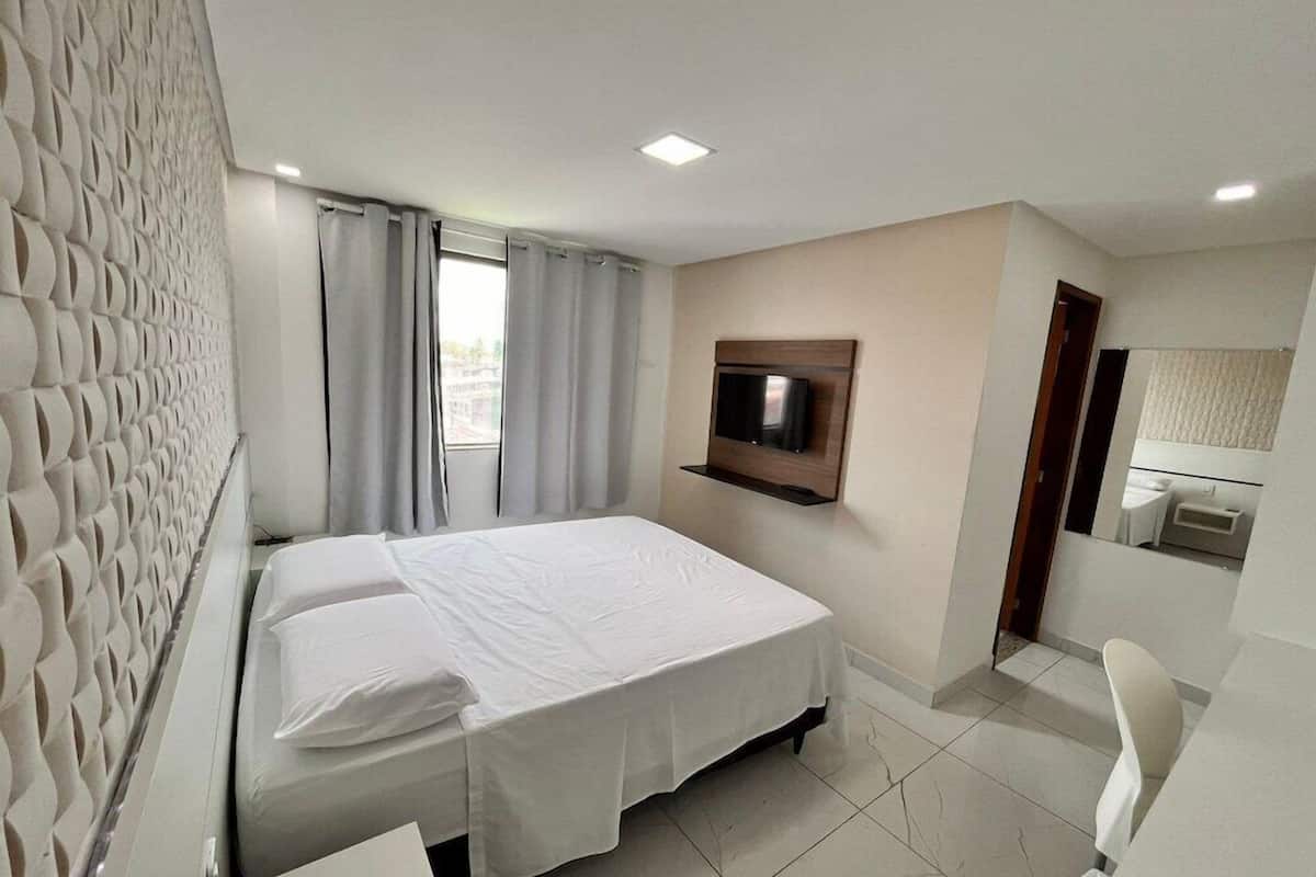Pillowtop beds, desk, laptop workspace, blackout drapes