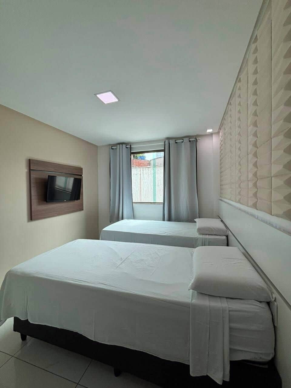 Pillowtop beds, desk, laptop workspace, blackout drapes