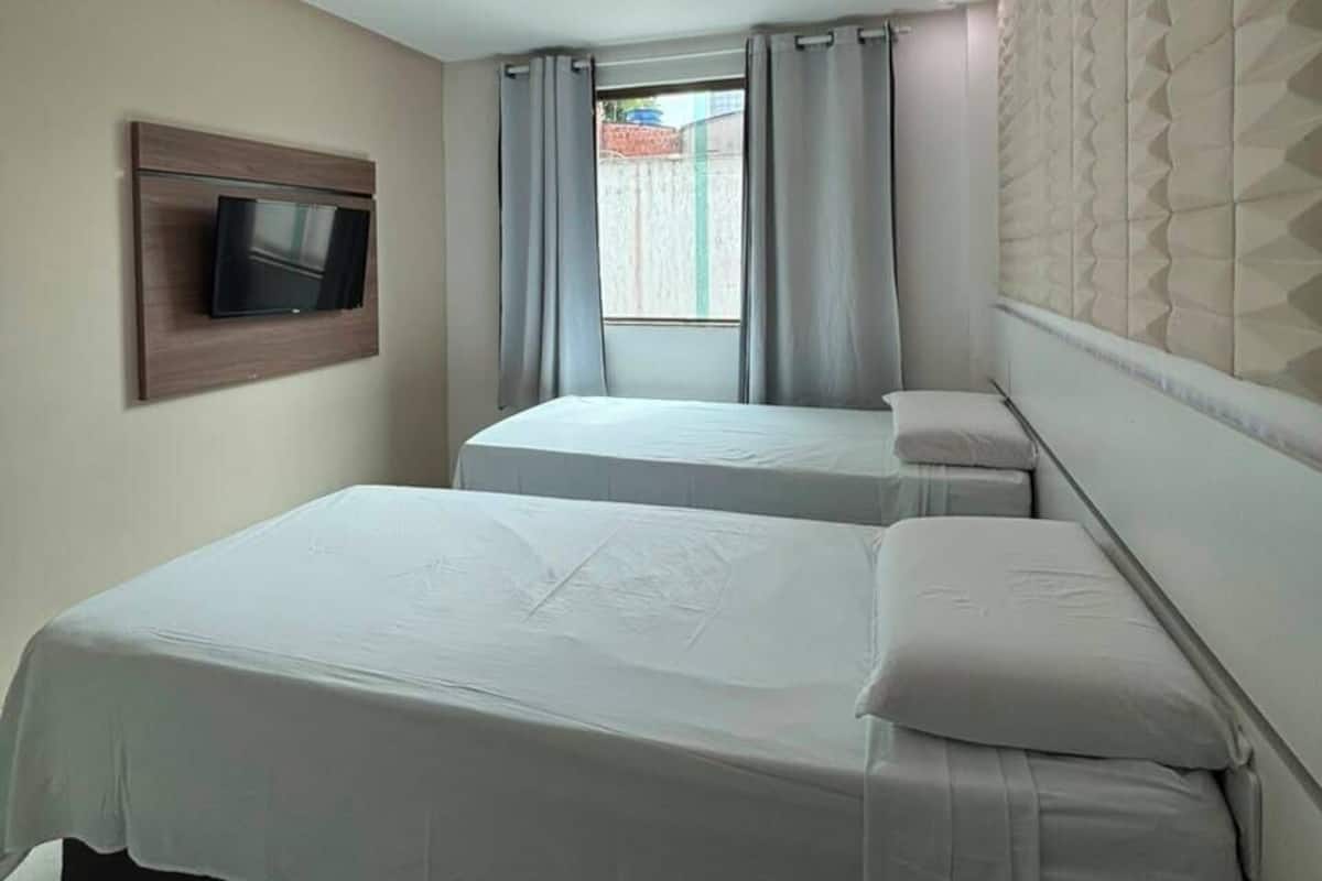 Pillowtop beds, desk, laptop workspace, blackout drapes