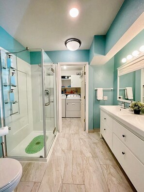 Shower, hair dryer, towels, soap