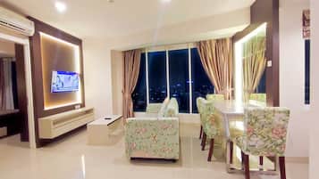 Exclusive Apartment, 2 Bedrooms | Living area | 32-inch flat-screen TV with cable channels, LCD TV, Netflix