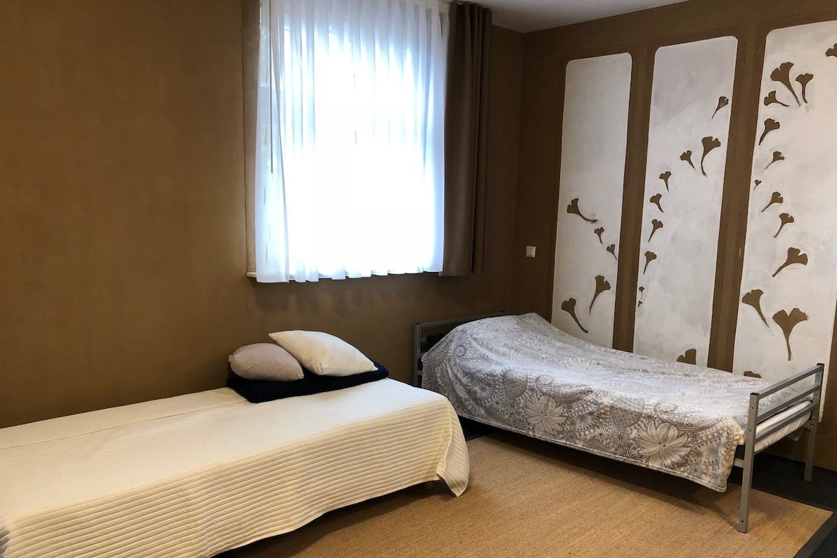 Desk, blackout curtains, free WiFi, bed sheets