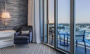 Hypo-allergenic bedding, in-room safe, desk, laptop workspace at Hotel Maren Fort Lauderdale Beach, Curio Collection by Hilton