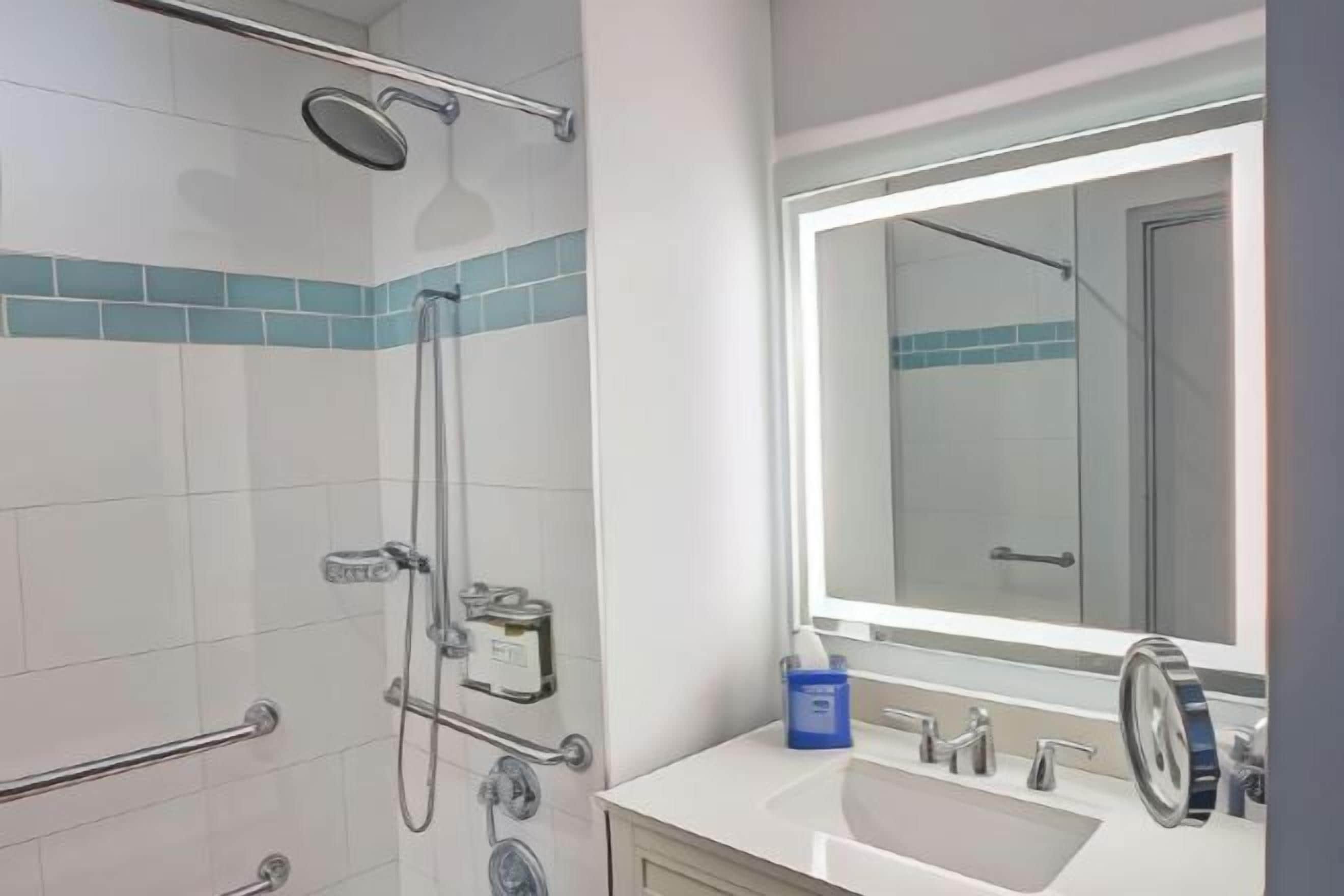 Bathroom | Designer toiletries, hair dryer, bathrobes, slippers