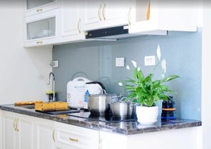 Fridge, microwave, cookware/dishes/utensils