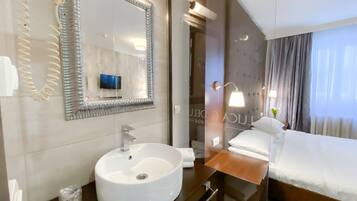 Comfort Room | Bathroom | Shower, hair dryer, slippers, towels