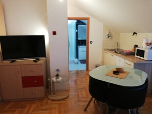 Estudio familiar | Área de sala de estar | Televisión de pantalla plana 