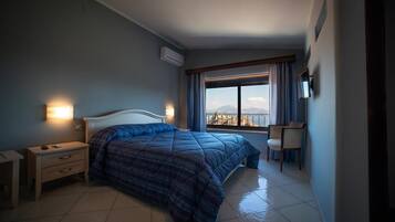 Panoramic Triple Room, Sea View | Minibar, desk, free WiFi, bed sheets