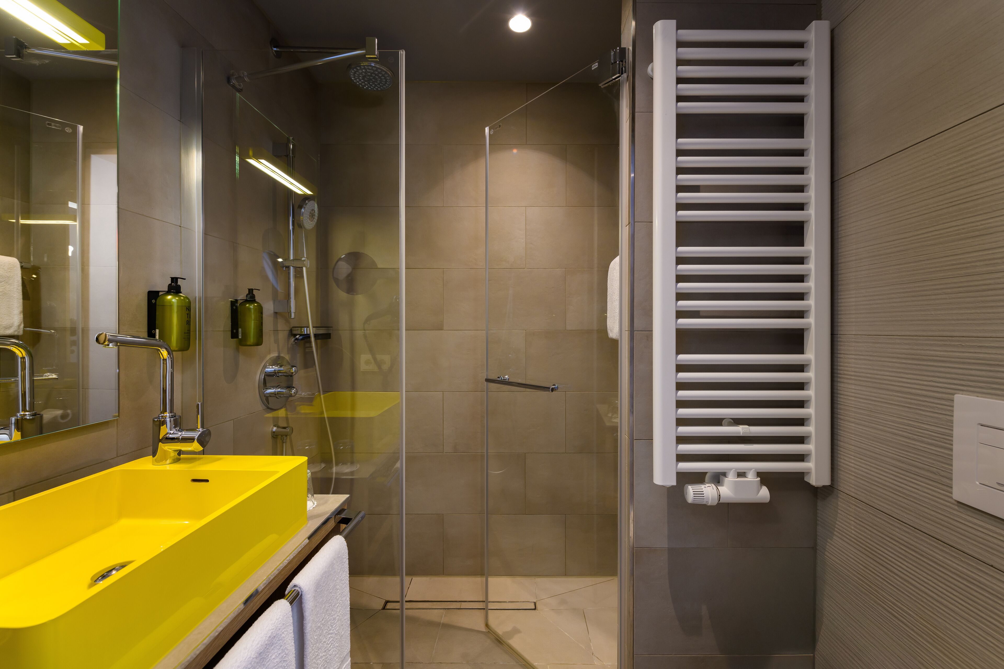 shower, rainfall showerhead, hair dryer, towels