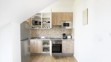 Apartamento, 1 quarto (2) | Cozinha privada | Geladeira grande, micro-ondas, fogão, cooktop