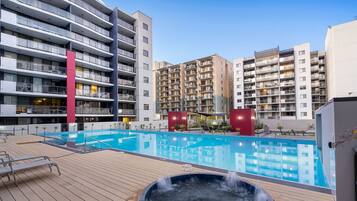 Outdoor pool, free pool cabanas, pool umbrellas