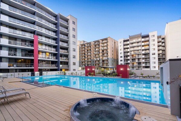 Outdoor pool, free pool cabanas, pool umbrellas