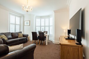 Comfort Apartment | Living area | TV