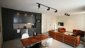 Apartment, 2 Bedrooms | Living room | Flat-screen TV