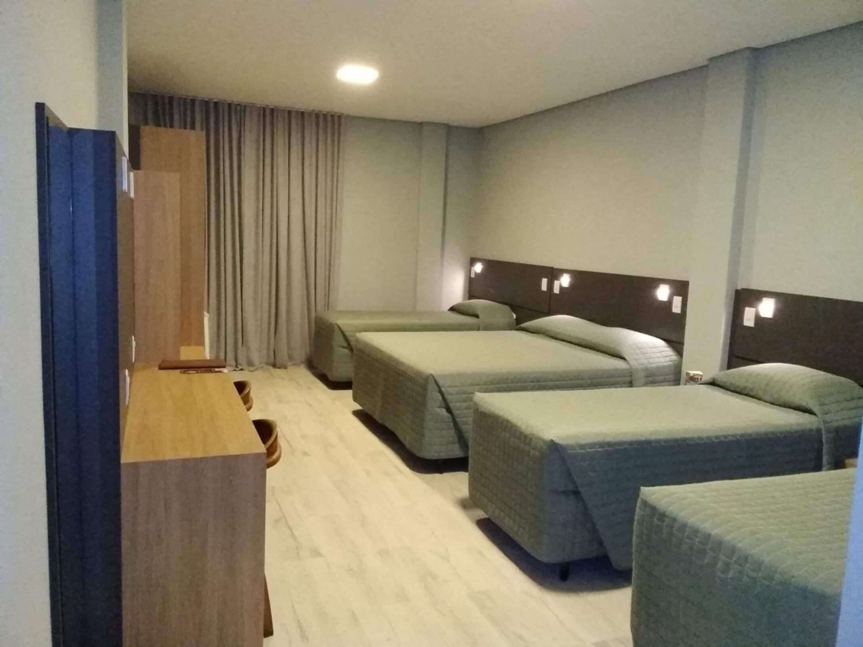 family room | 1 bedroom, minibar, desk, blackout curtains