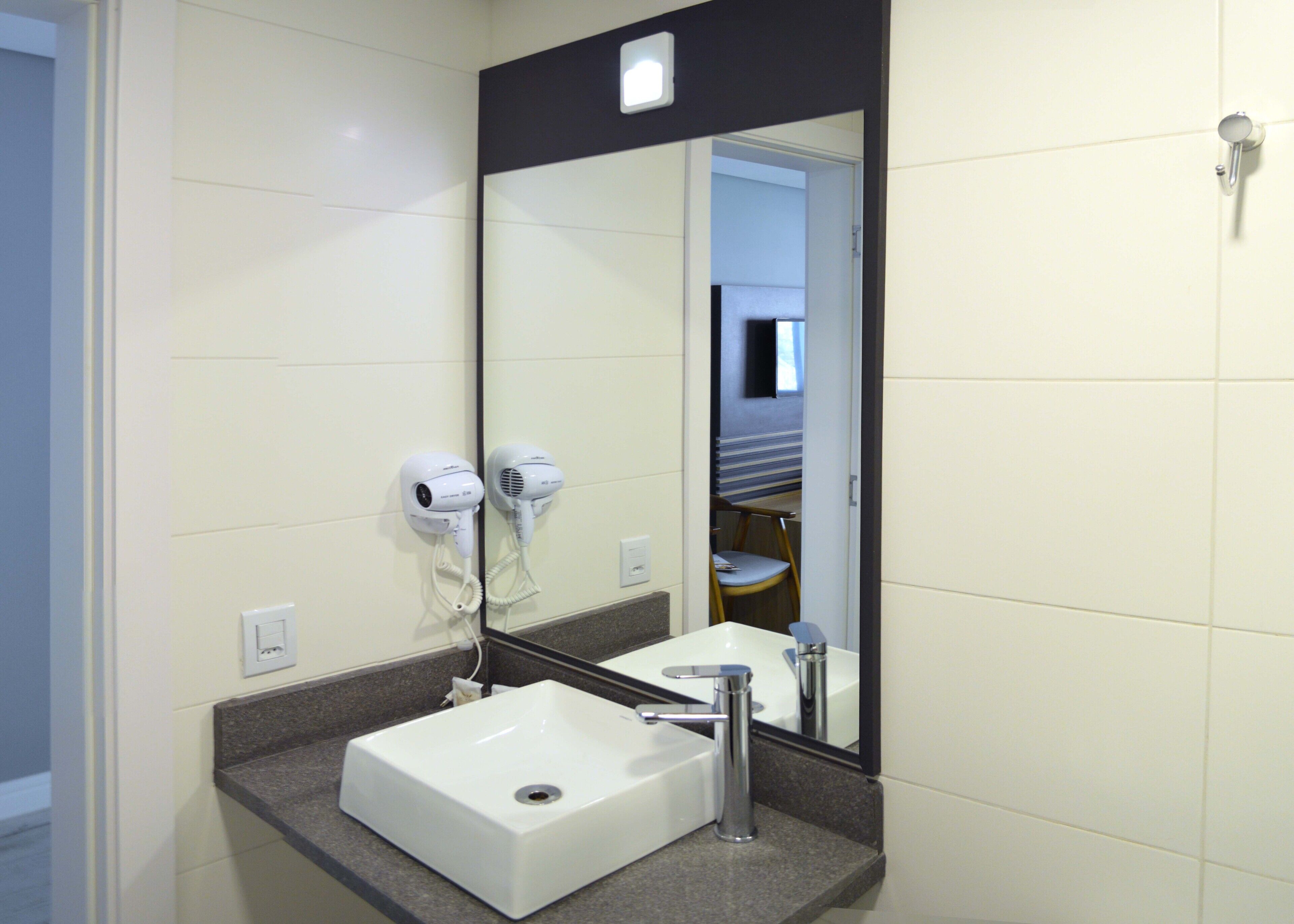 deluxe quadruple room | bathroom sink