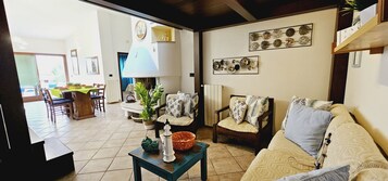 Appartamento, 1 camera da letto | Area soggiorno | TV