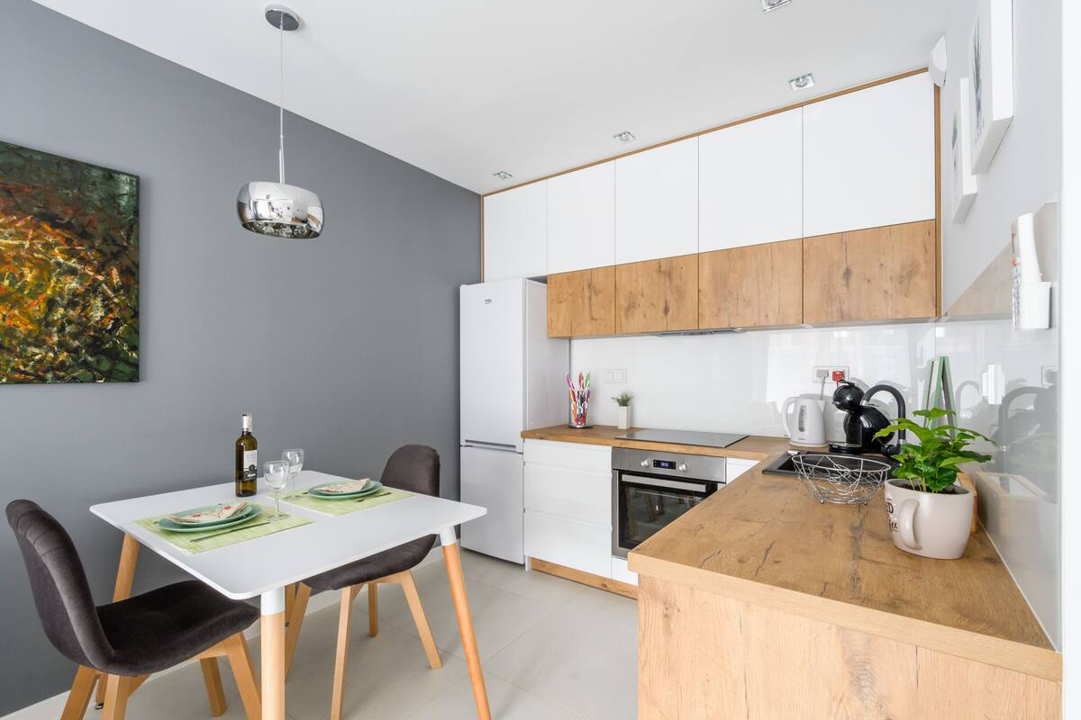 deluxe apartment | private kitchenette | full-sized fridge, oven, stovetop, dishwasher