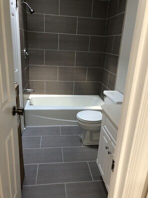 Hair dryer, towels, soap, shampoo