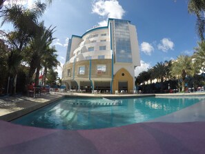 Outdoor pool, pool umbrellas, sun loungers