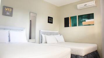 Premium bedding, blackout drapes, soundproofing, free WiFi