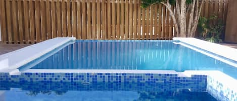 Outdoor pool, pool umbrellas, pool loungers