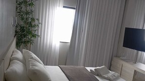 Suite – deluxe | Minibar og sengetøy