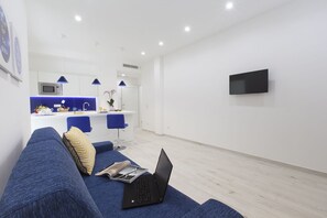 Apartment, 2 Bedrooms | Living area | TV
