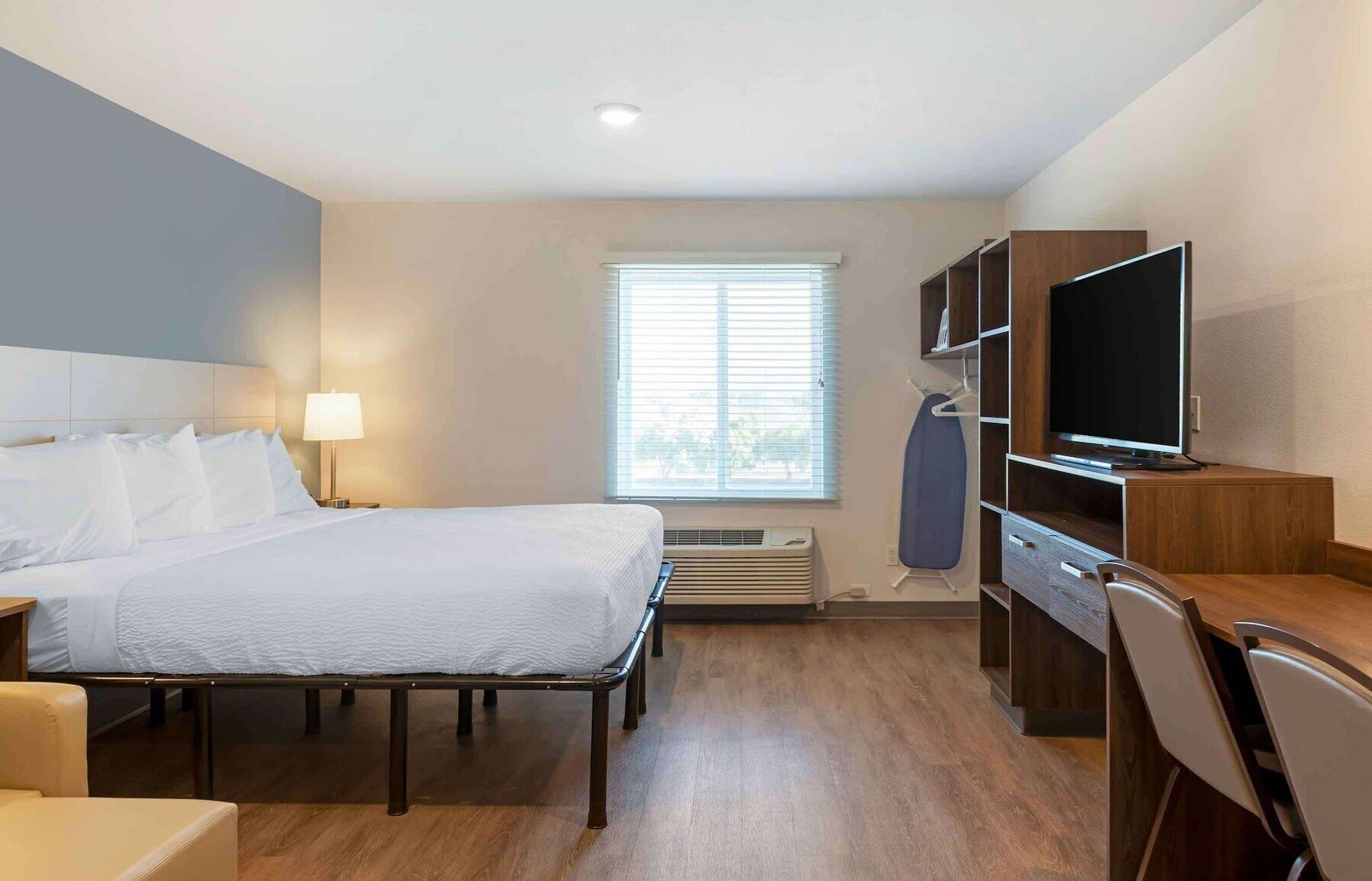 Desk, laptop workspace, free WiFi, bed sheets