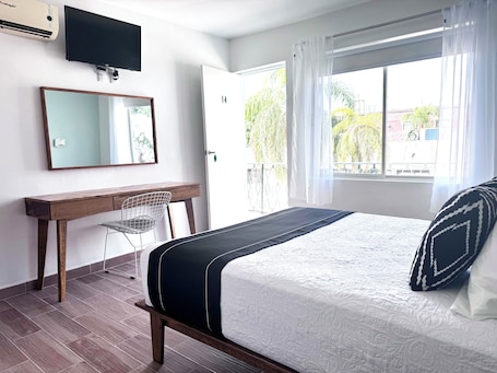 Chambre Deluxe | Chambres insonorisées, fer et planche à repasser, Wi-Fi gratuit. Hotel La Siesta