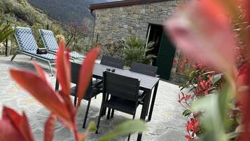 Superior Quadruple Room, Garden Area | Terrace/patio