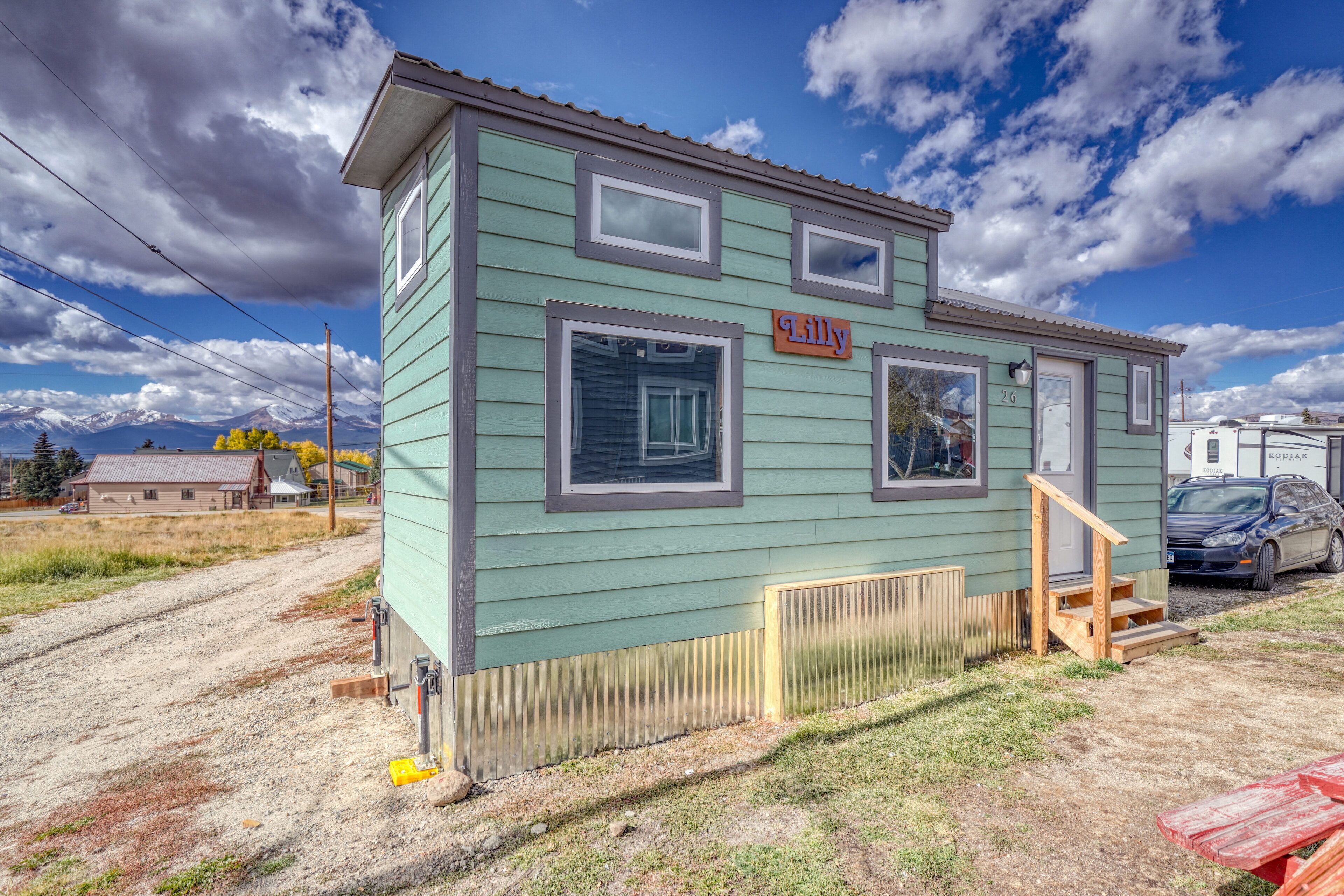 A small, single-story building with a nameplate reading "Lilly" and a number "2G" on the side.