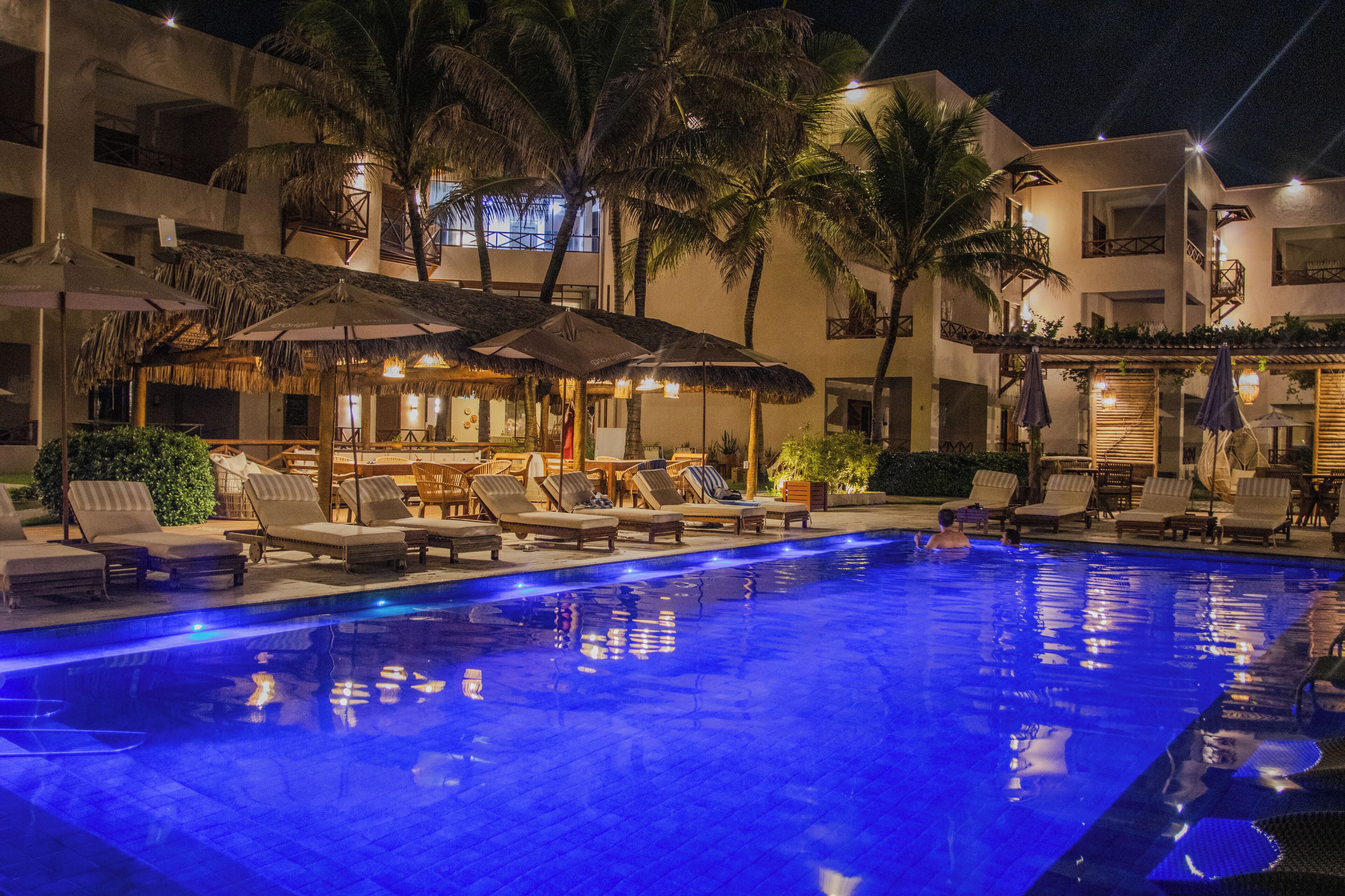 outdoor pool, open 8:00 am to 8:00 pm, pool umbrellas, pool loungers