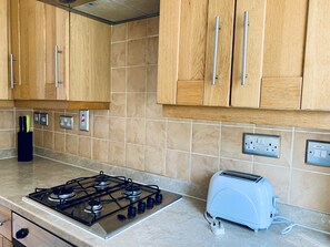 Fridge, microwave, oven, cookware/dishes/utensils